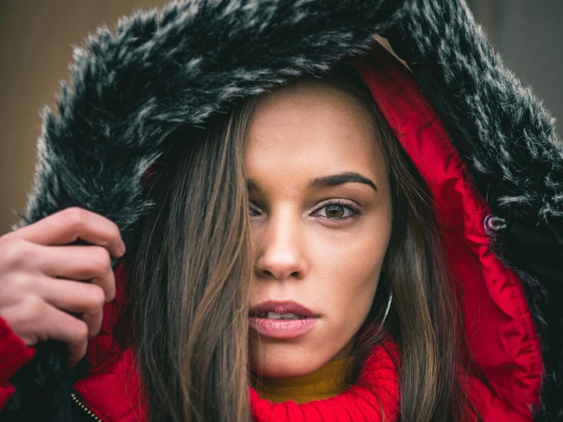 Person looking into the distance with a focused expression